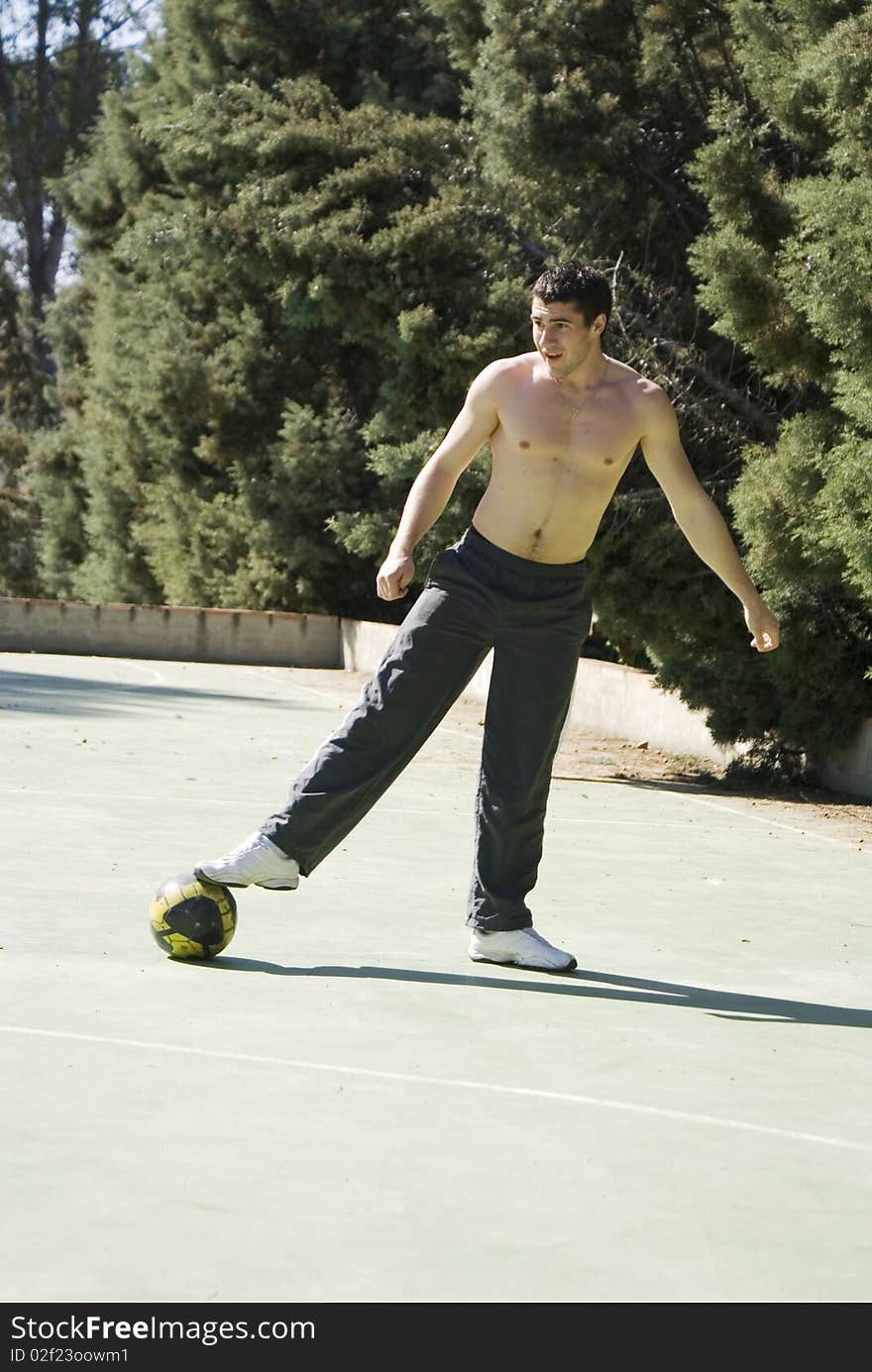 Young man playing football