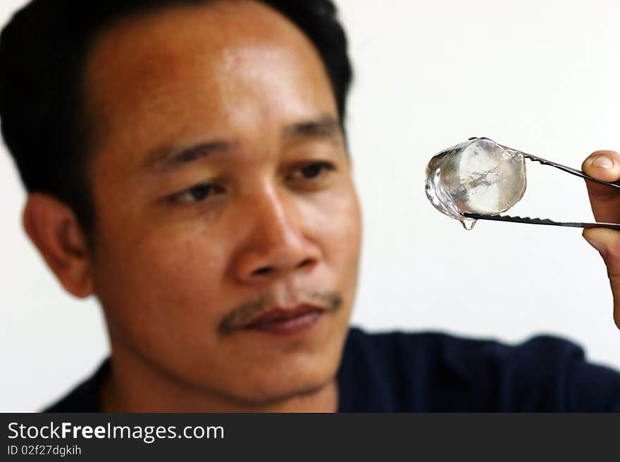 Man checking  ice water clean