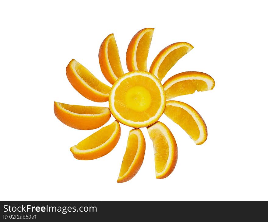 Segments of an orange and half of orange on a white background close up