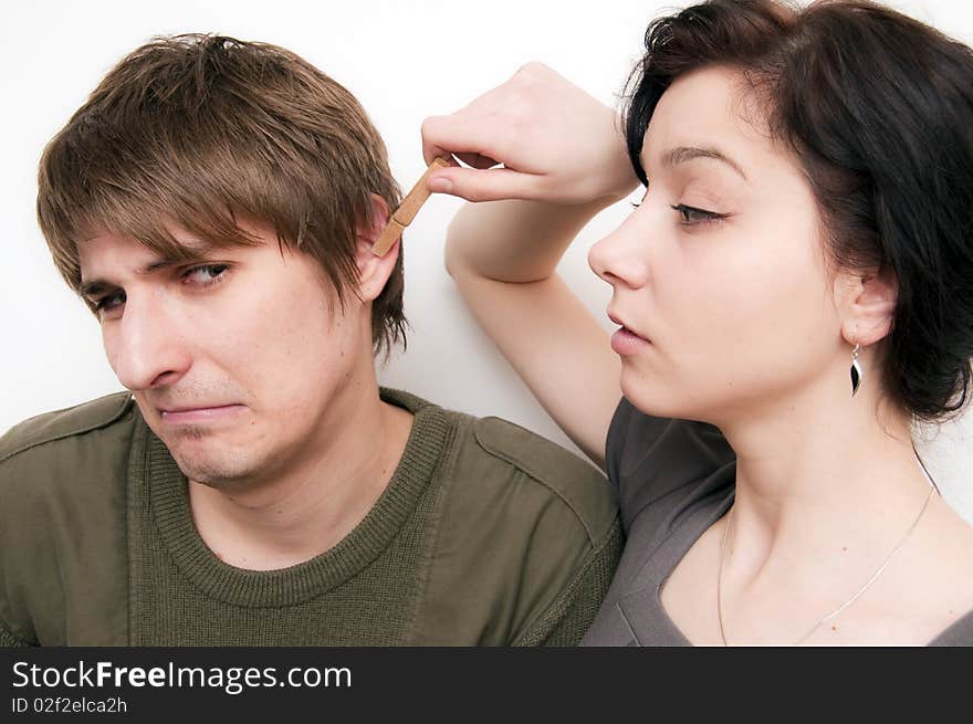 Young Couple Scene, she clip his ear with a clothes pin