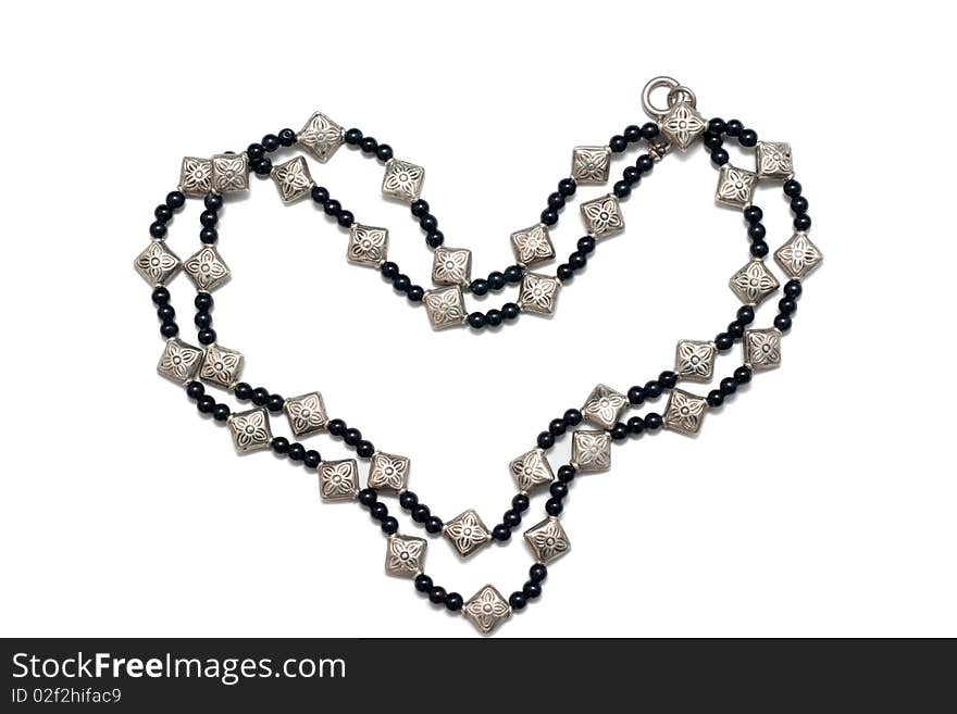 Chain  with jewels in shape of heart isolated on white. Chain  with jewels in shape of heart isolated on white