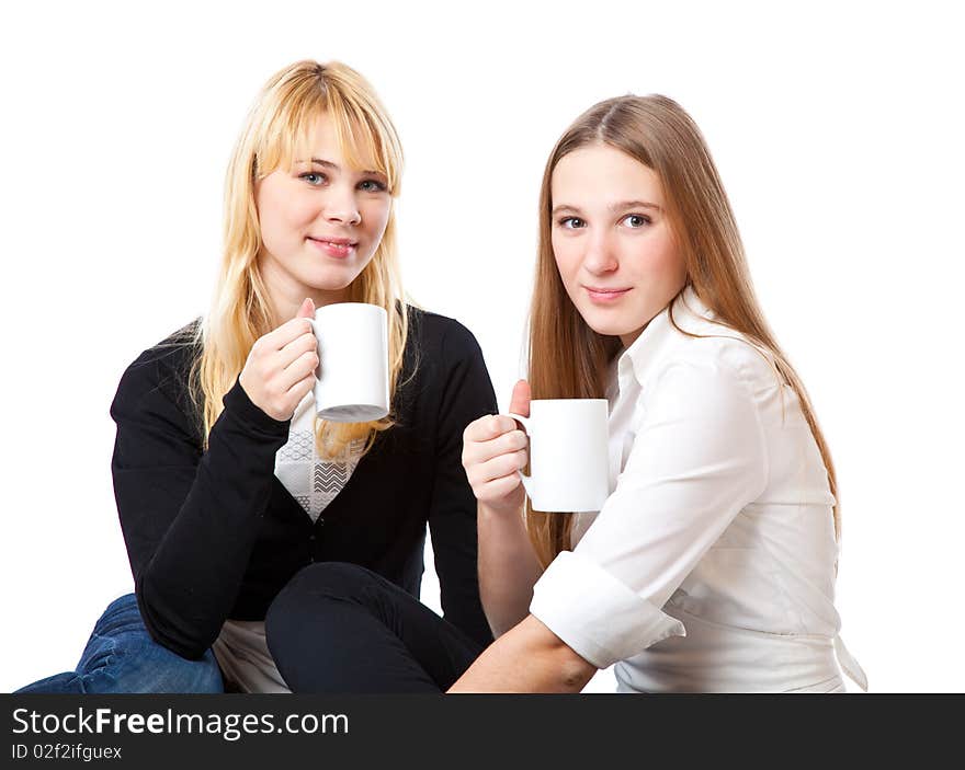 Two Teenage Girls Is Drinking Tea