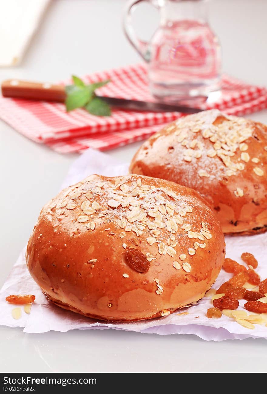 Sweet bread topped with rolled oats - closeup