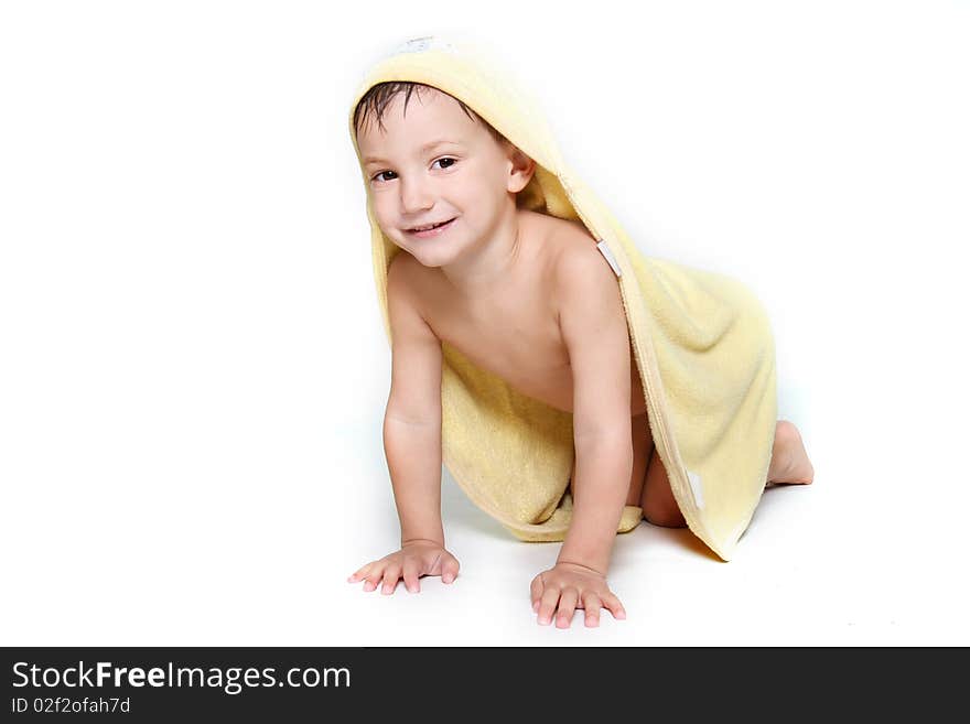 Boy in towel after bath