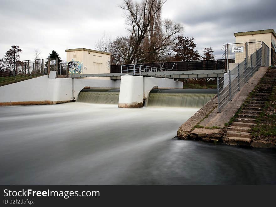 A river weir / barrage shot with grey filter