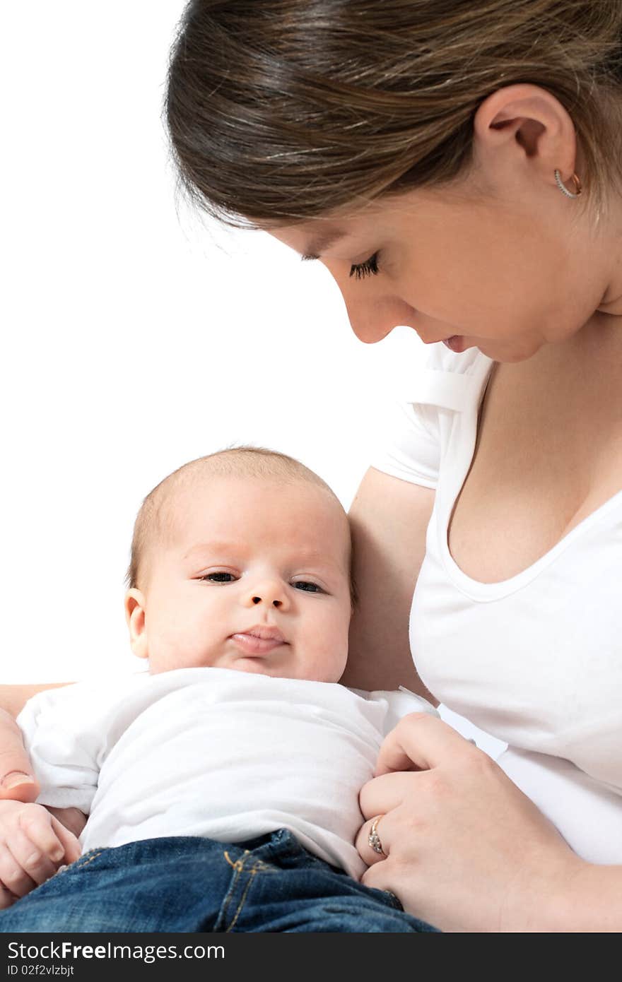 Happy family: mother and baby playing and smiling - isolates on white. Happy family: mother and baby playing and smiling - isolates on white