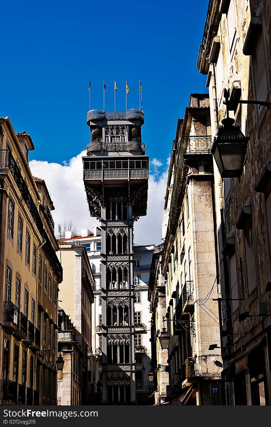 Santa Justa Elevator in Lisbon, Portugal. Connecting downtown to Bairro Alto (the lowest and highest points of the city). Made by the French architect Raoul de Mesnier du Ponsard (an apprentice of Gustave Eiffel, explaining the structure's similarities to Paris' Eiffel Tower)