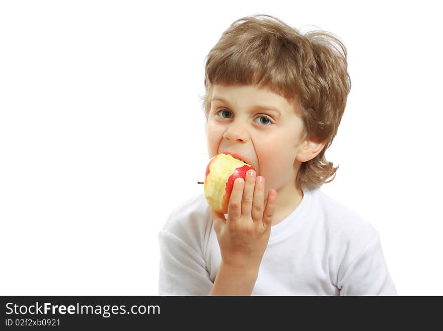 Little beautiful child playing and eating an apple - isolated on white. Little beautiful child playing and eating an apple - isolated on white