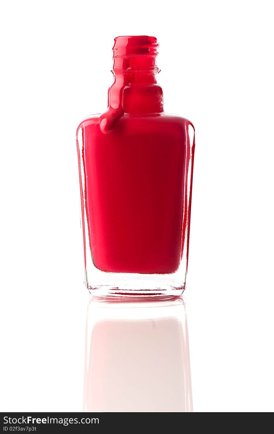 Red Nail Polish Running Out Of A Container