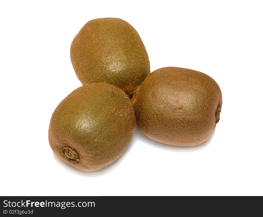 Three ripe kiwi. Isolated over white.