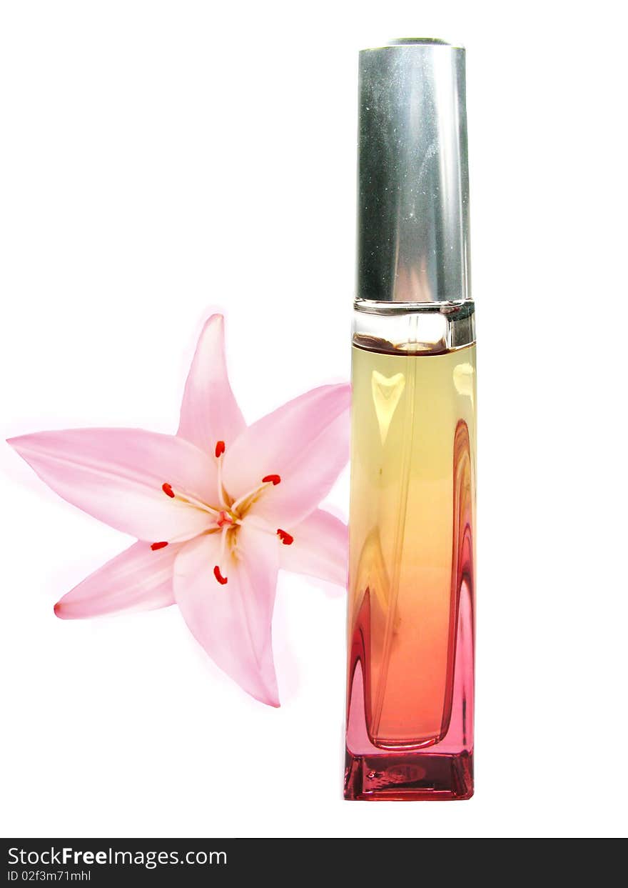 Red luxury perfume with lily flower on background. Red luxury perfume with lily flower on background