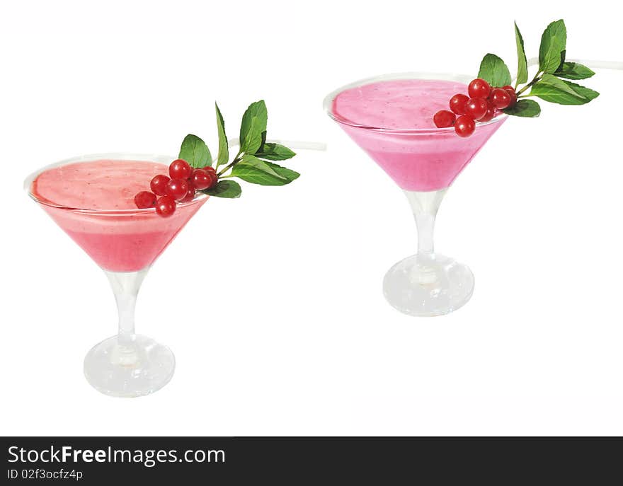 Fruit cocktails decorated by red currant and mint