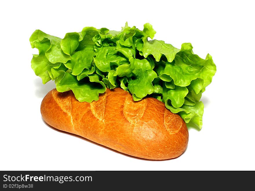 Fresh salad with a bun on a white background. Fresh salad with a bun on a white background