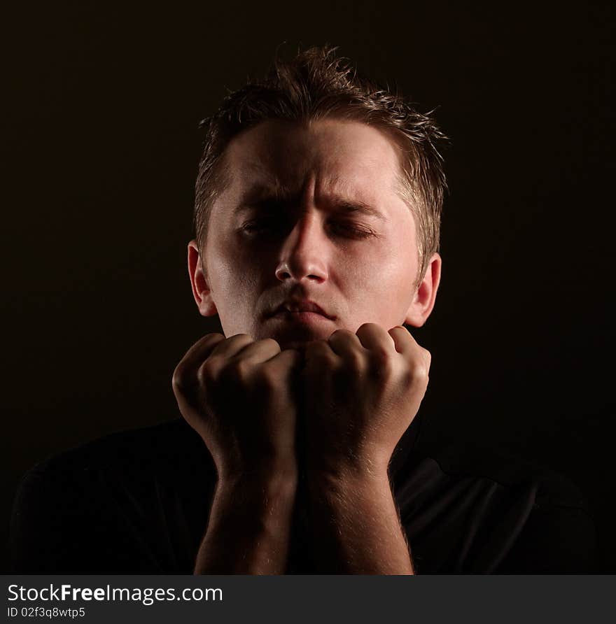 Photo of man on dark background