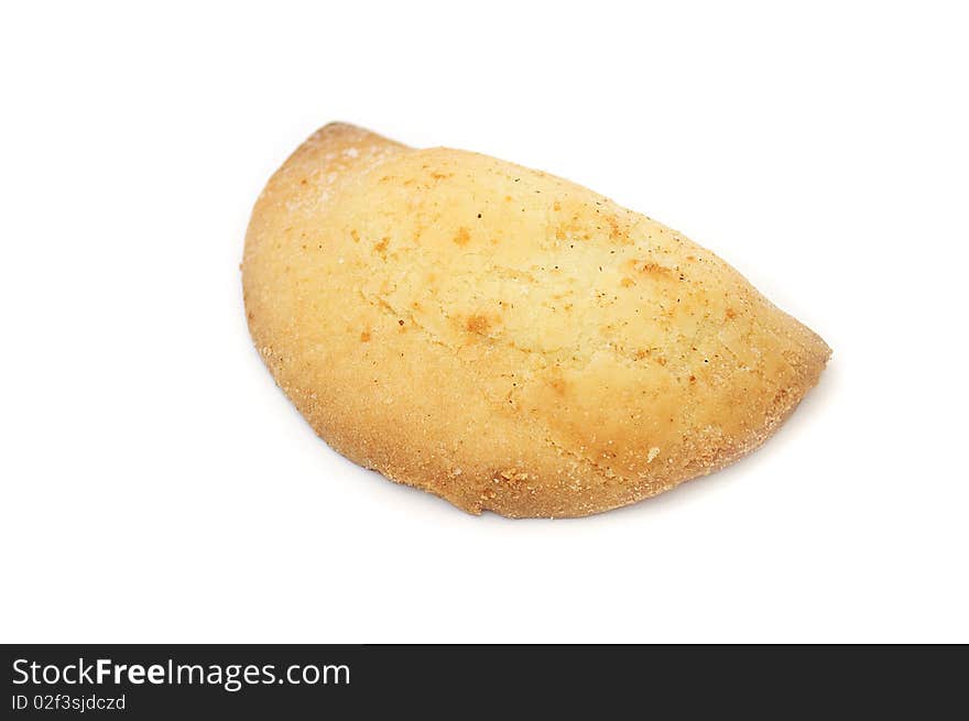 A freshly baked bun with curd filling isolated on a white background