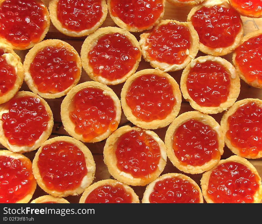 Red caviar in a tartlet. Вackground