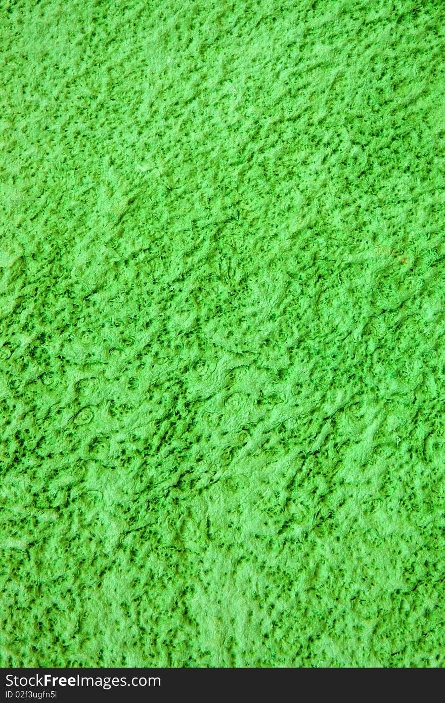 Structure of a cardboard of green colour after secondary processing. Structure of a cardboard of green colour after secondary processing