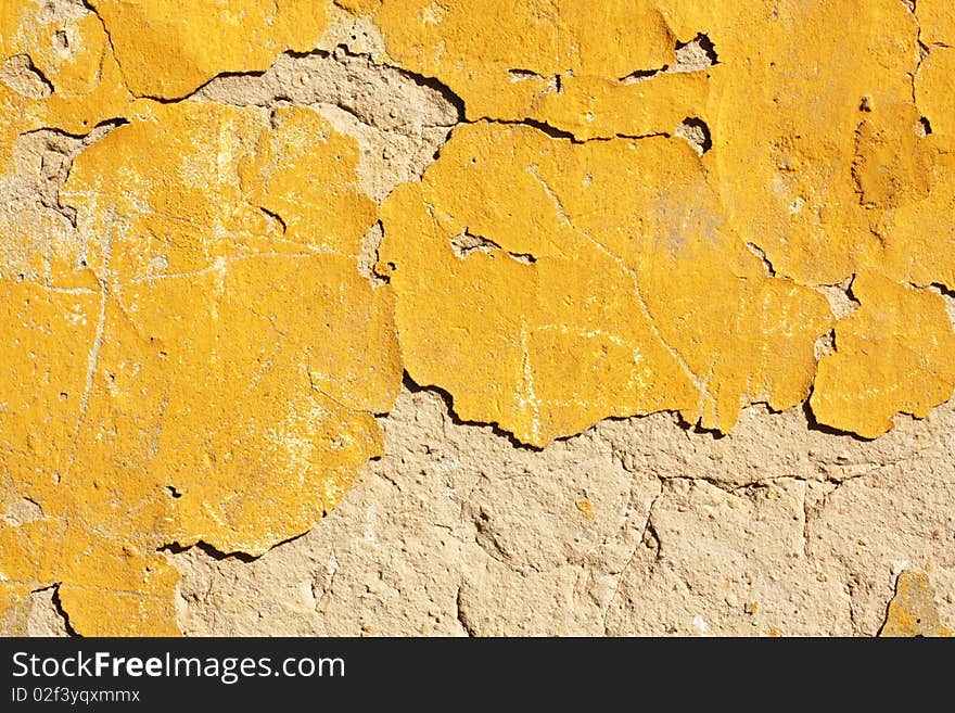 Grunge Cement Wall and Yellow Plaster