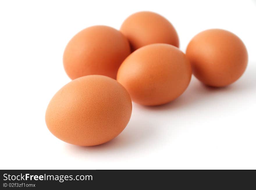 Group of chicken eggs isolated on white