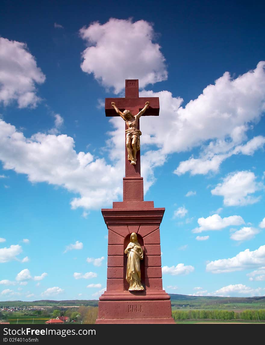 Jesus on the cross with clouds