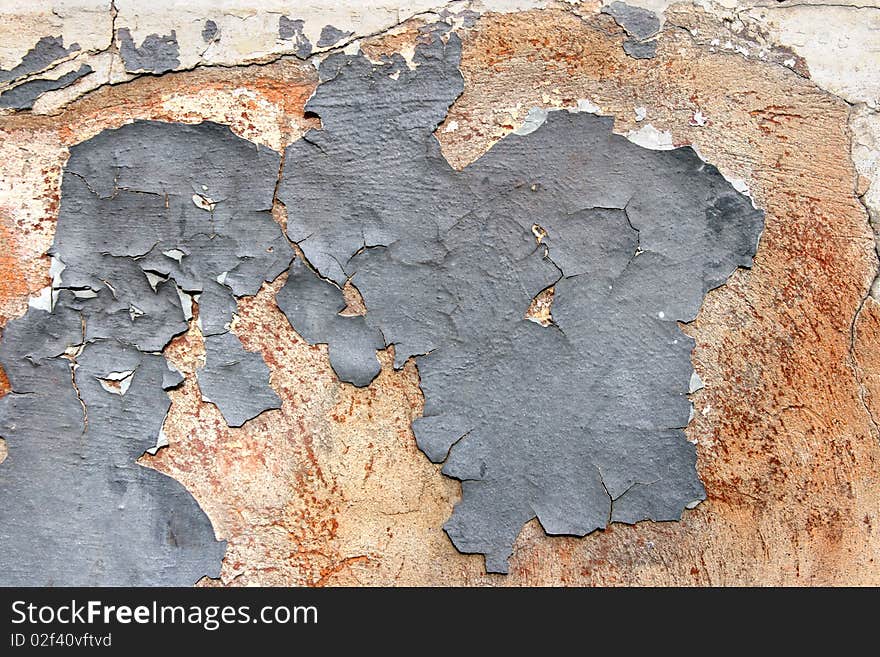 Grunge scratched texture / background on a cracked stone wall. Grunge scratched texture / background on a cracked stone wall.