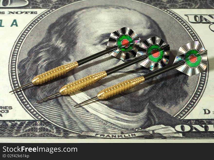 Dollar and darts. Concept of  business