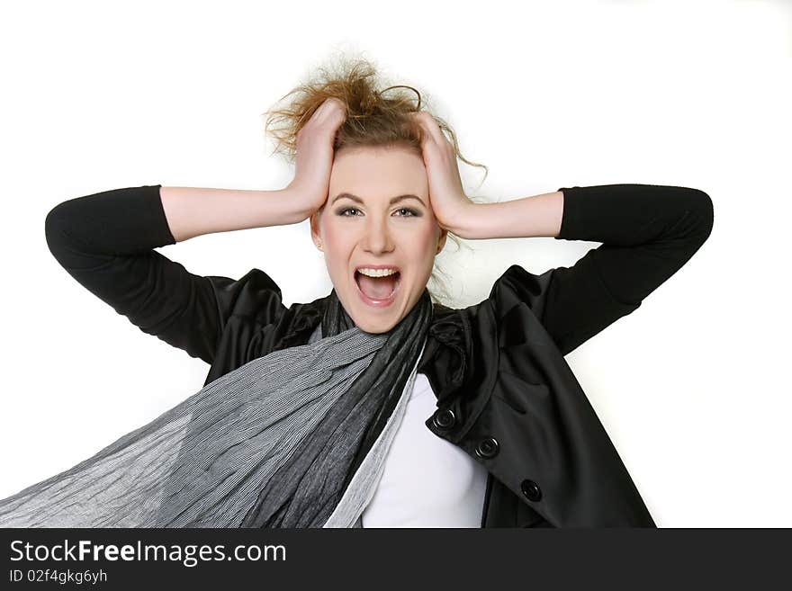 Young fashionable woman shouting loudly over white