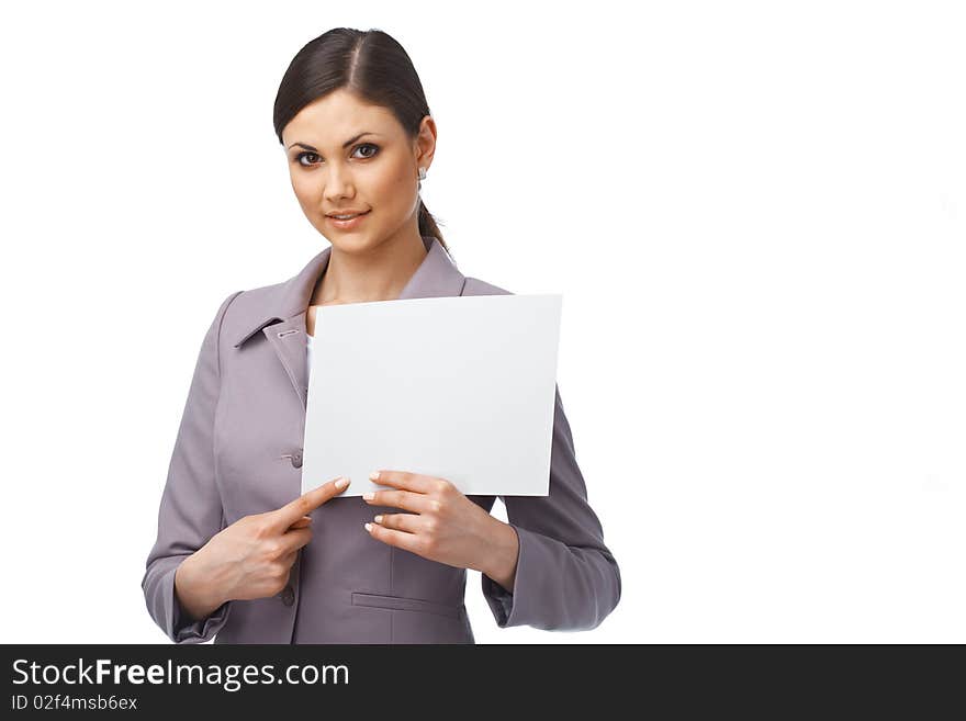 Portrait of a young business woman pointing on the paper she is holding. Portrait of a young business woman pointing on the paper she is holding