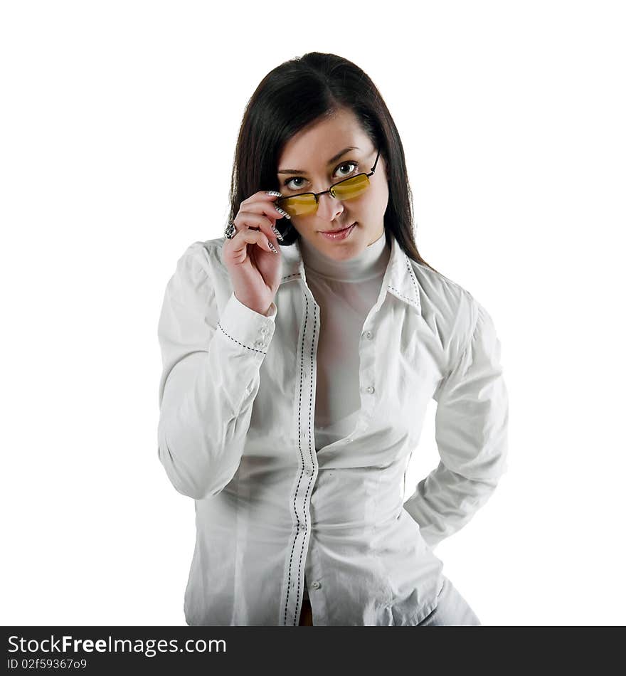 Close-up Portrait of a beautiful young woman in a white shirt and glasses. Close-up Portrait of a beautiful young woman in a white shirt and glasses