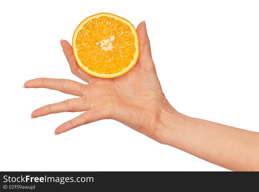 Orange in the woman's hand for keping the diet