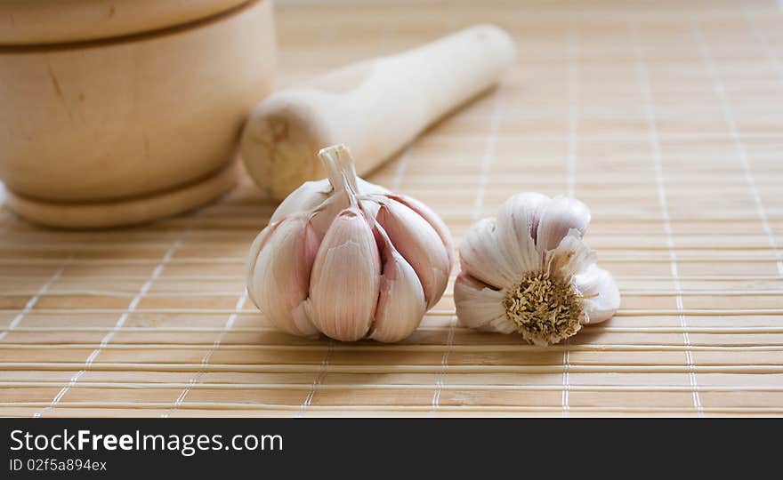 Garlic on the bamboo. macro. Garlic on the bamboo. macro