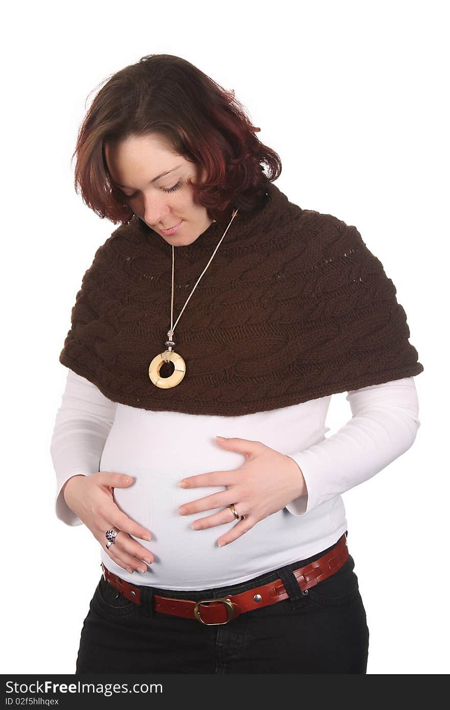 Pregnant woman holding belly on white background