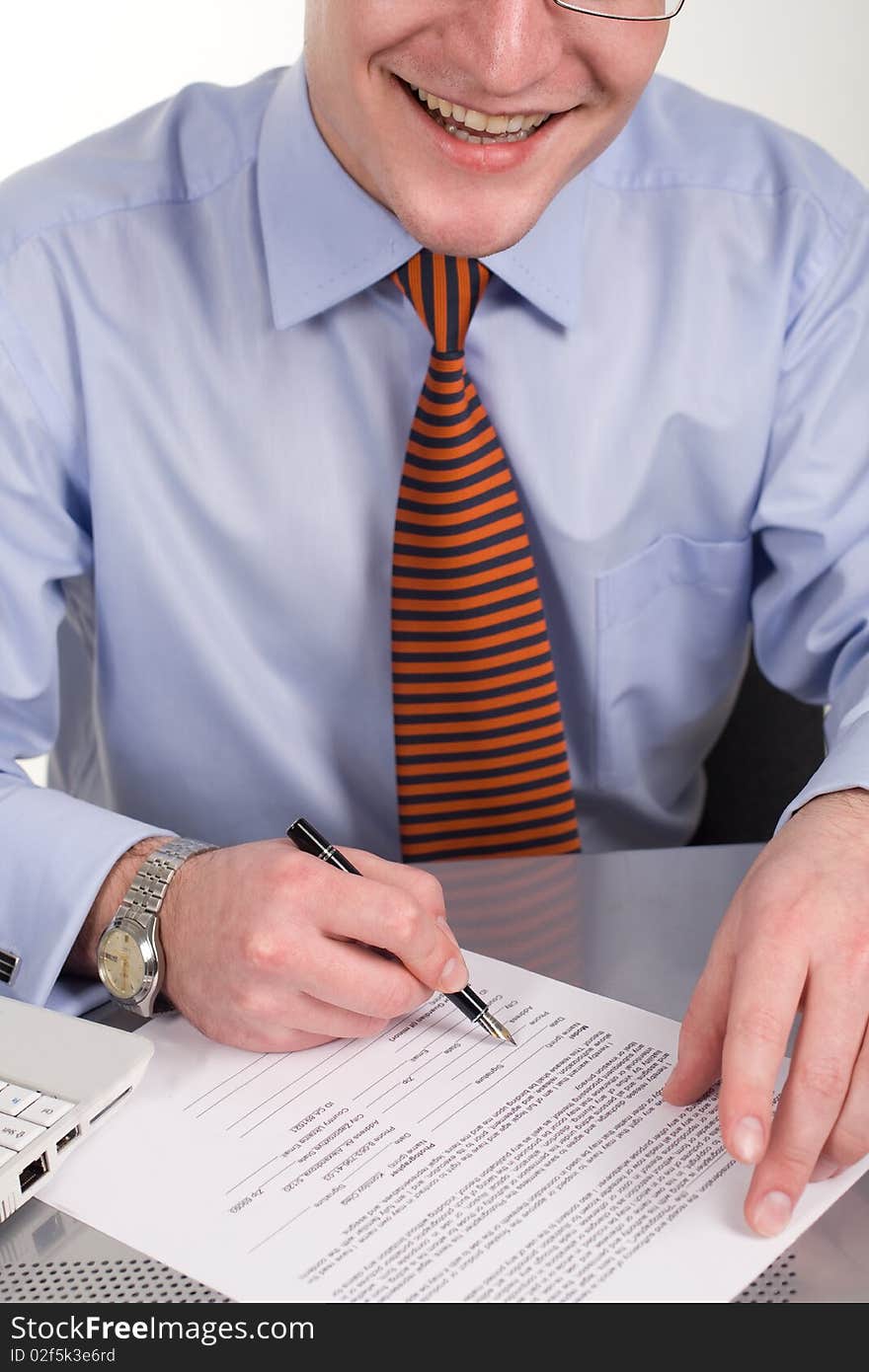 Businessman signing document with pen, isolated