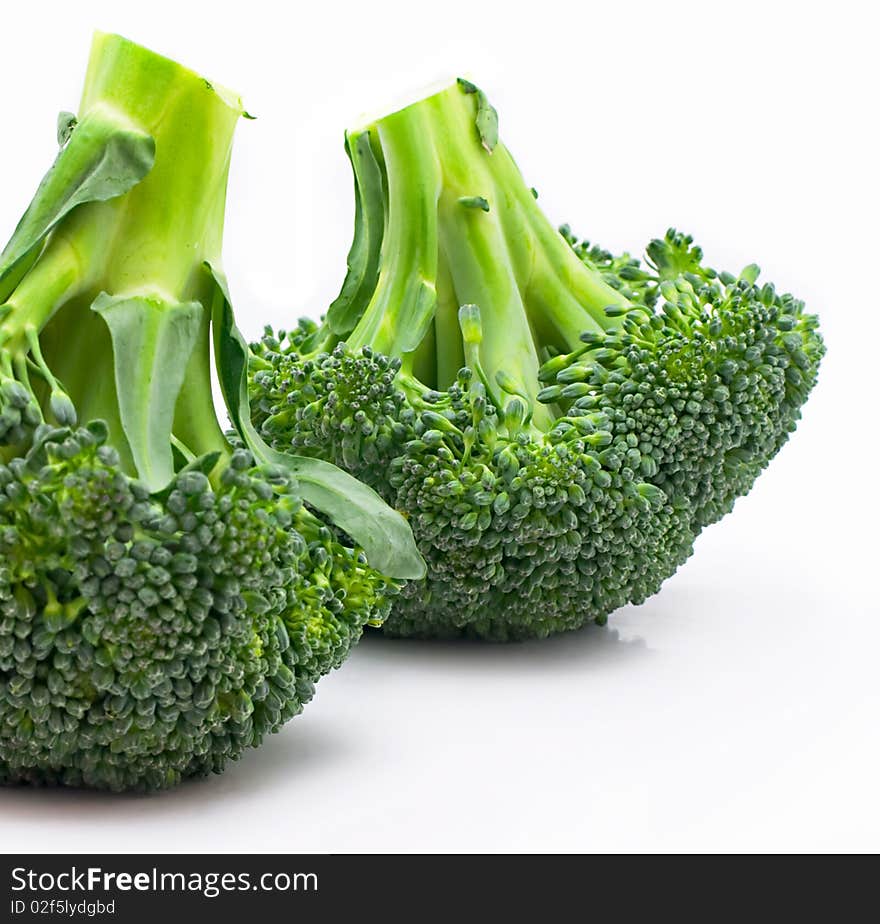 Two branches of cabbage of a broccoli on a white background