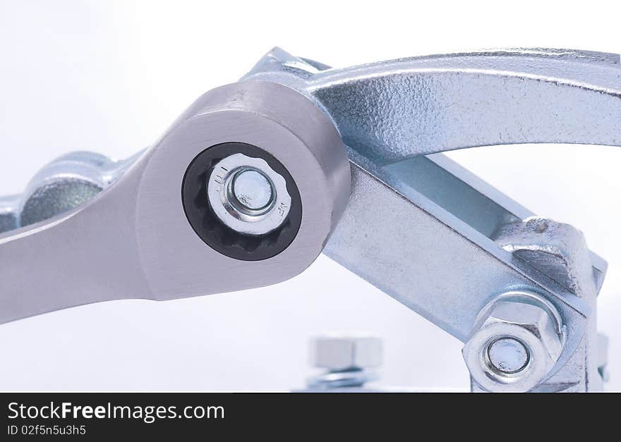 Spanner, wrench and silver bolt on white background close up. Spanner, wrench and silver bolt on white background close up