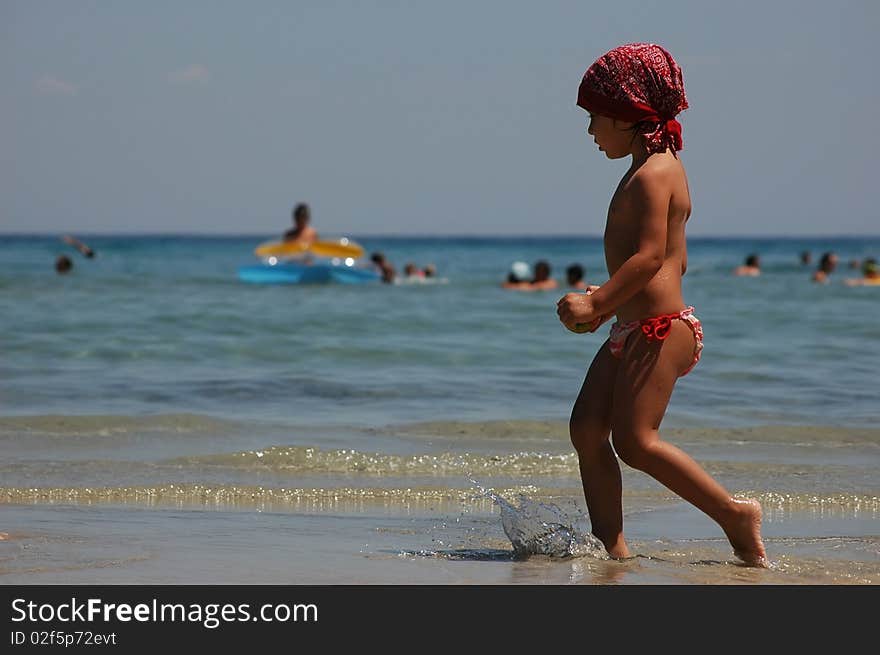 A pretty little girl on the beach. A pretty little girl on the beach