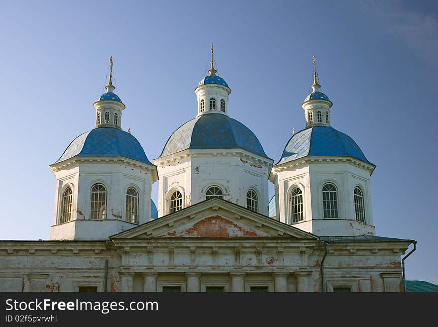 Three cupola of old church over blue sky. Three cupola of old church over blue sky