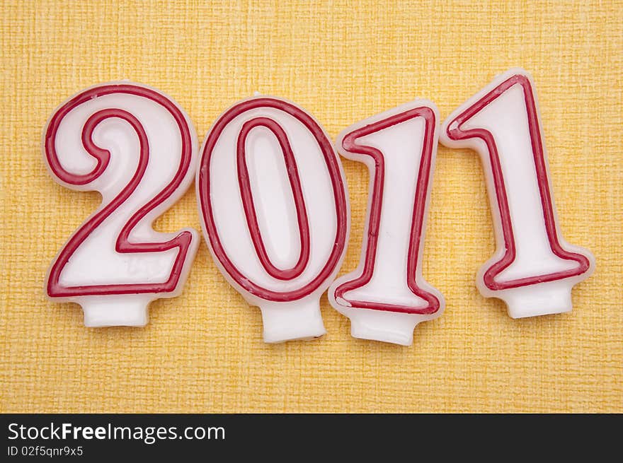 2011 for the New Year on a yellow background. 2011 for the New Year on a yellow background.