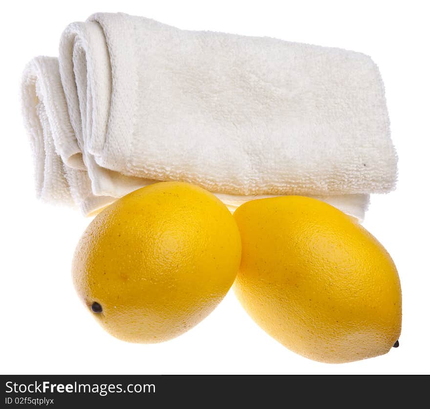 Fresh lemons are at the center of this spa related image. Fresh lemons are at the center of this spa related image.