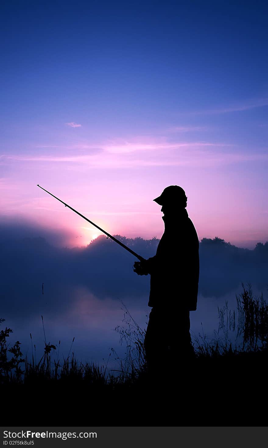 Fishing early in the morning, on blossoming, on a photo the photographer. Fishing early in the morning, on blossoming, on a photo the photographer