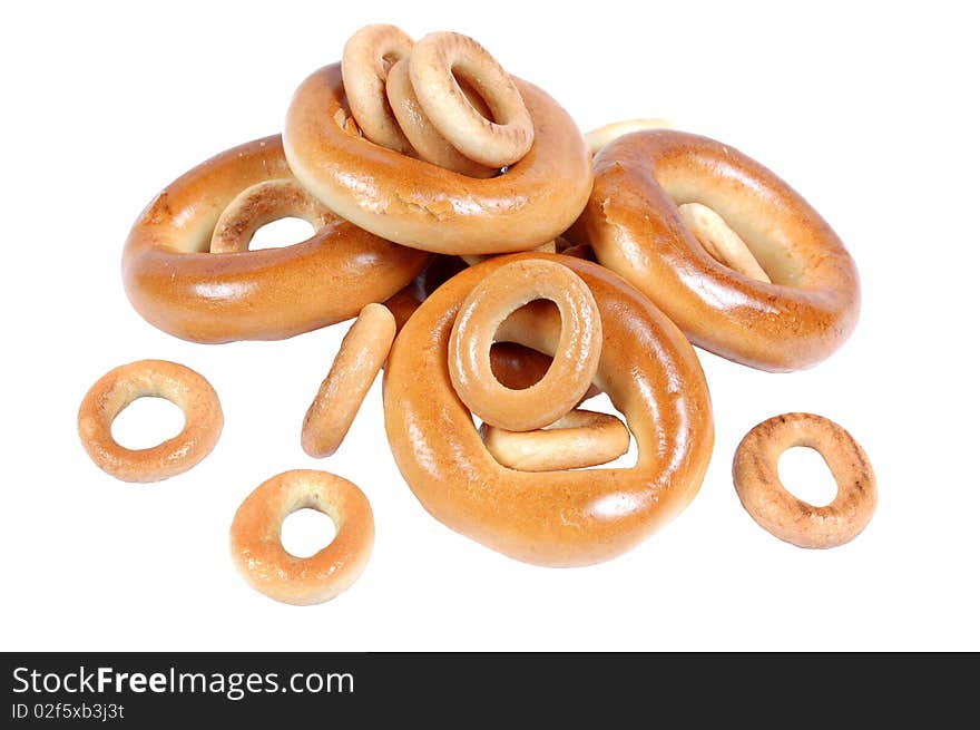 Steering-wheels and bagels on a white background. Steering-wheels and bagels on a white background