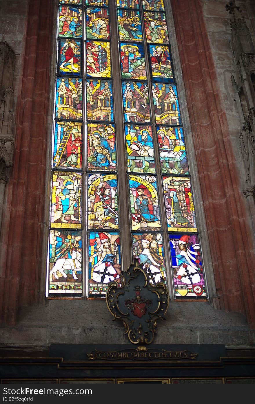 Colorful window in the church called Sebaldus Kirche in Nuremberg Germany. This church is one of the most prominent historical churches in Nuremberg. Colorful window in the church called Sebaldus Kirche in Nuremberg Germany. This church is one of the most prominent historical churches in Nuremberg.