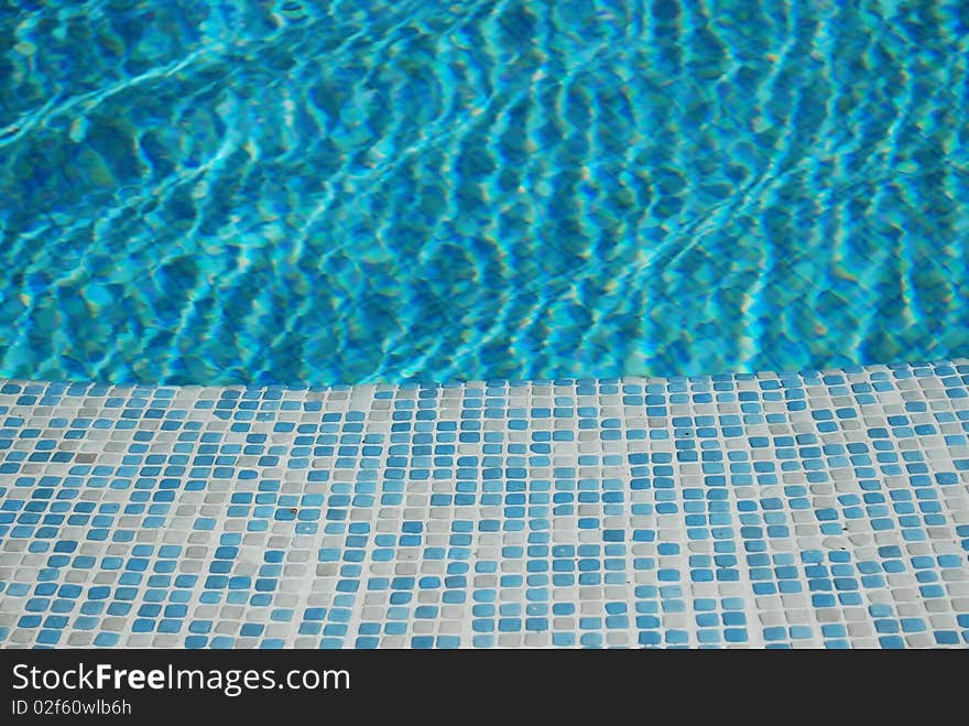 Blue water in a pool. Blue water in a pool