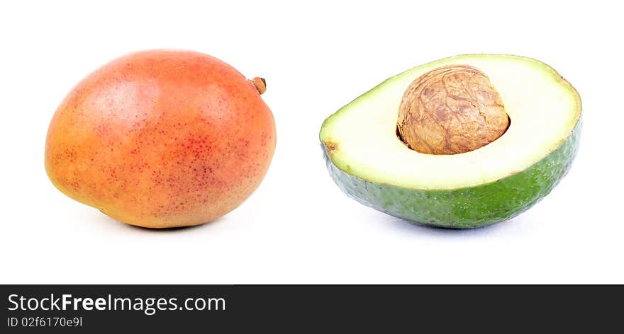 Mango and cutted avocado  on white