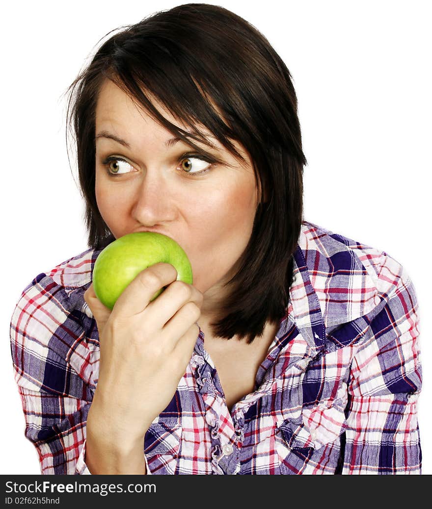 Portrait of a cheerful girl eating an apple