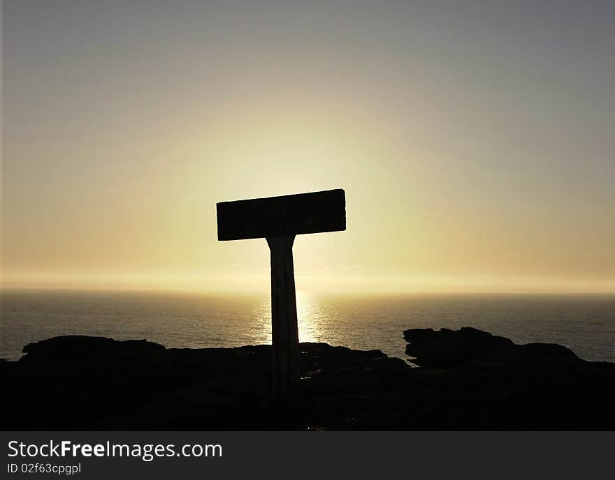 Sign silhouette on top of the mountain