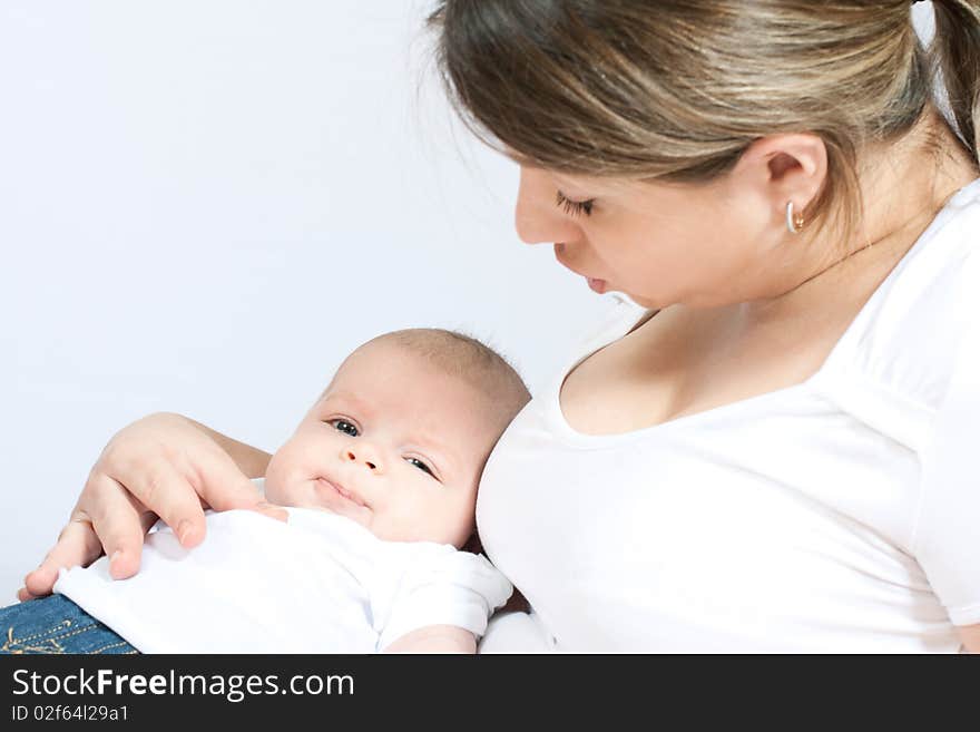 Happy family: mother and baby - playing and smiling. Happy family: mother and baby - playing and smiling