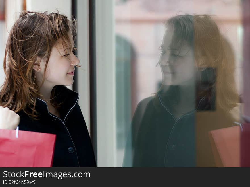 Young woman with shopping bags