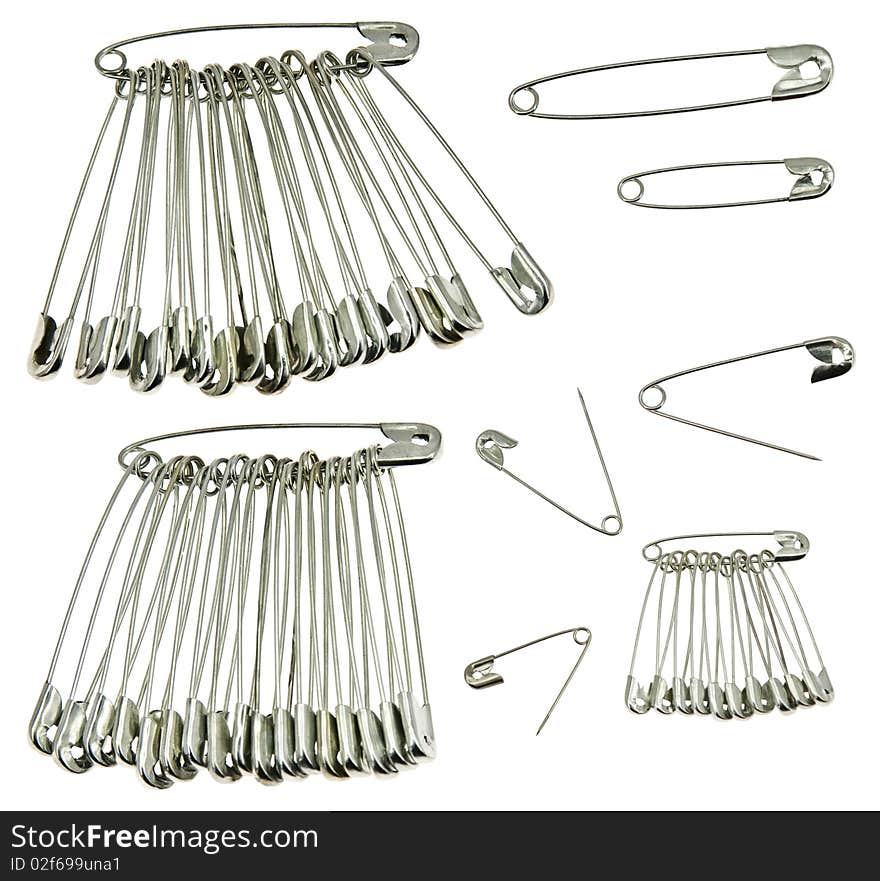 Safety Pins on white isolated