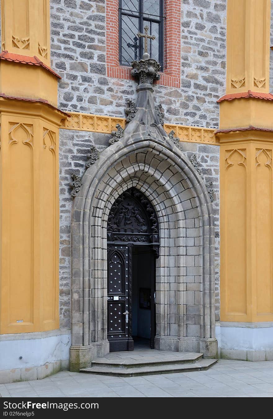 Main entrance doorway to a church in the South Bohemia.